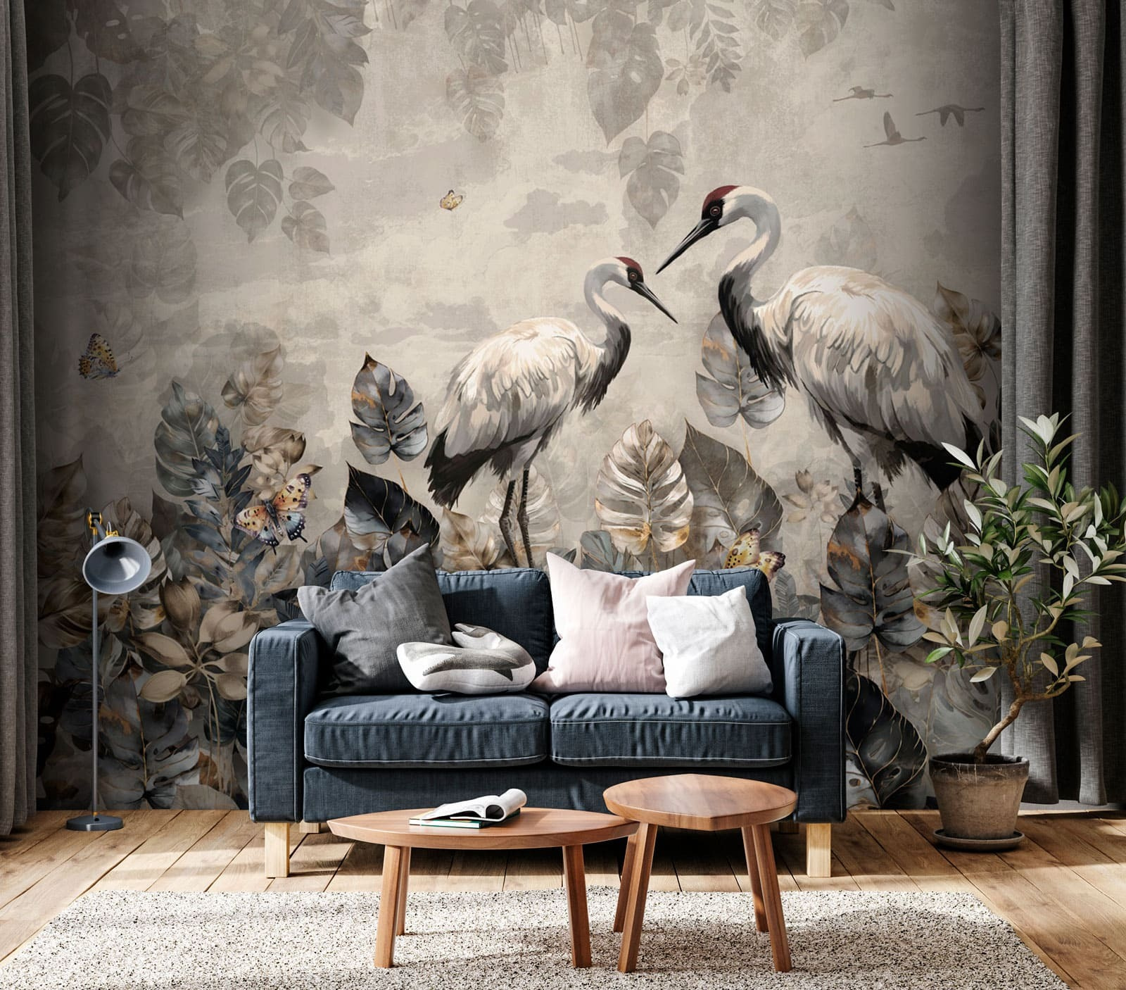 Couple of cranes standing in a field of leaves