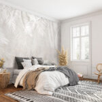 Fototapet Frunze albe pe o suprafață gri