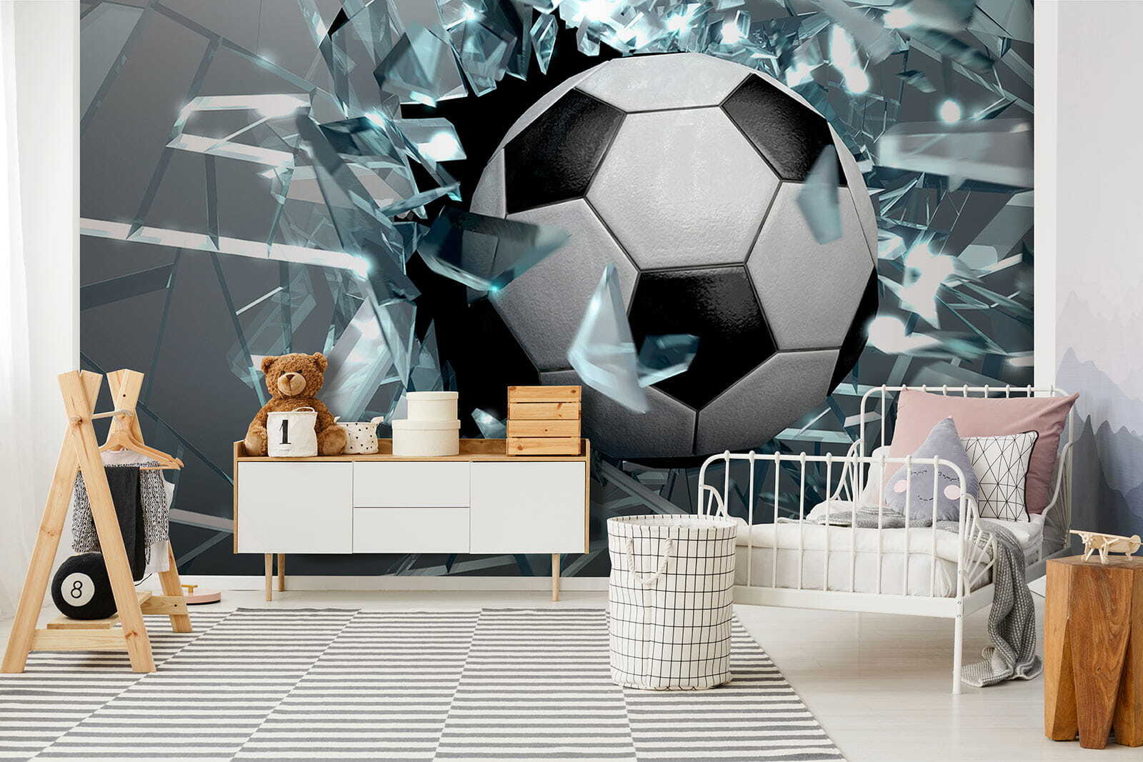 Football ball breaking through glass