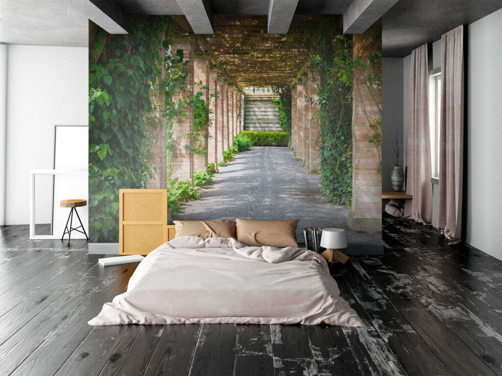 Walkway with stone pillars and vines