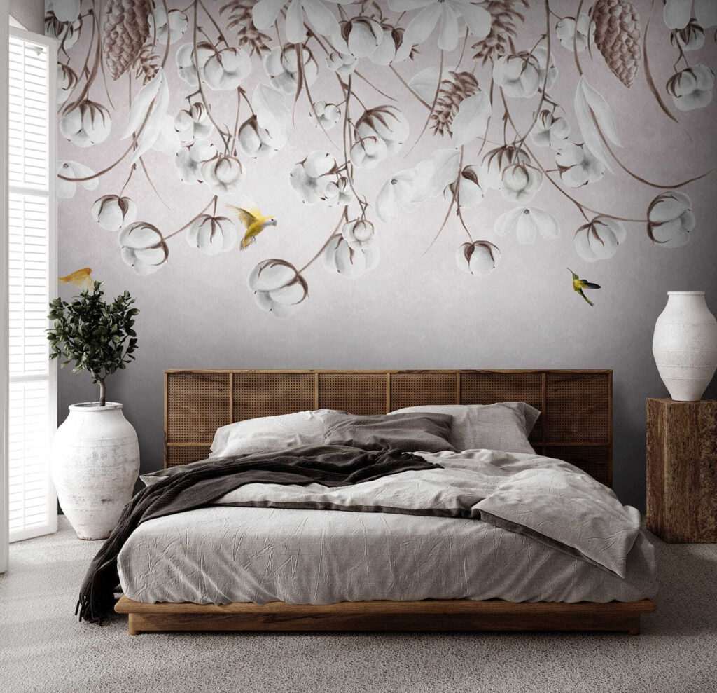 Bird flying over cotton flowers