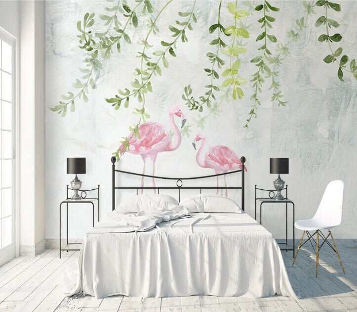 Două flamingo roz cu frunze verzi