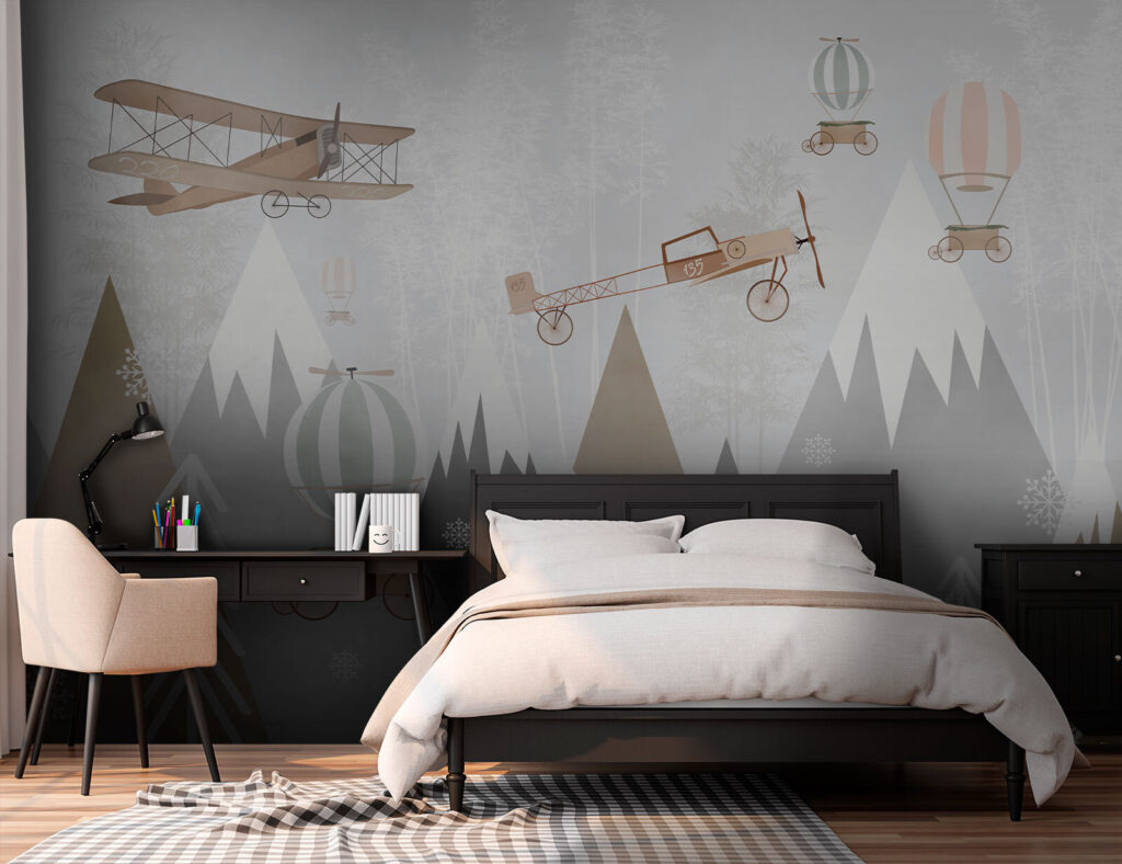 Wall mural of airplanes and hot air balloons flying over mountains