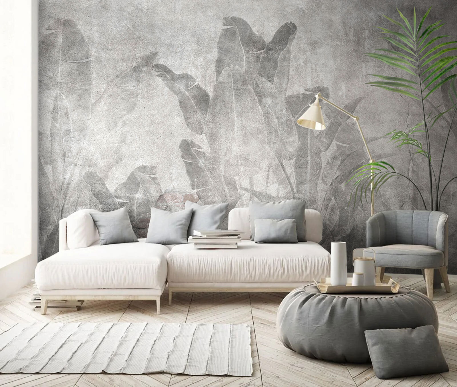 Grey wall with leaves and a brick wall