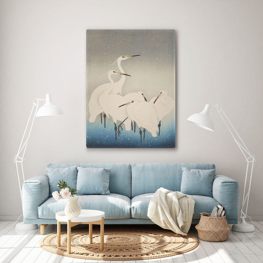 A group of white birds with long beaks