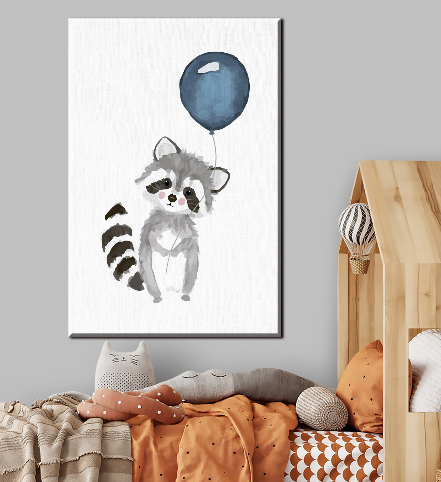A raccoon holding a balloon A raccoon holding a balloon