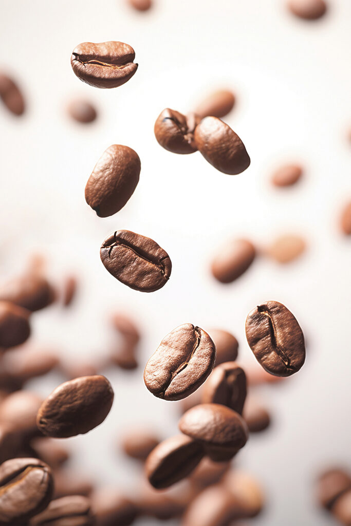 Coffee beans falling in the air Coffee beans falling in the air