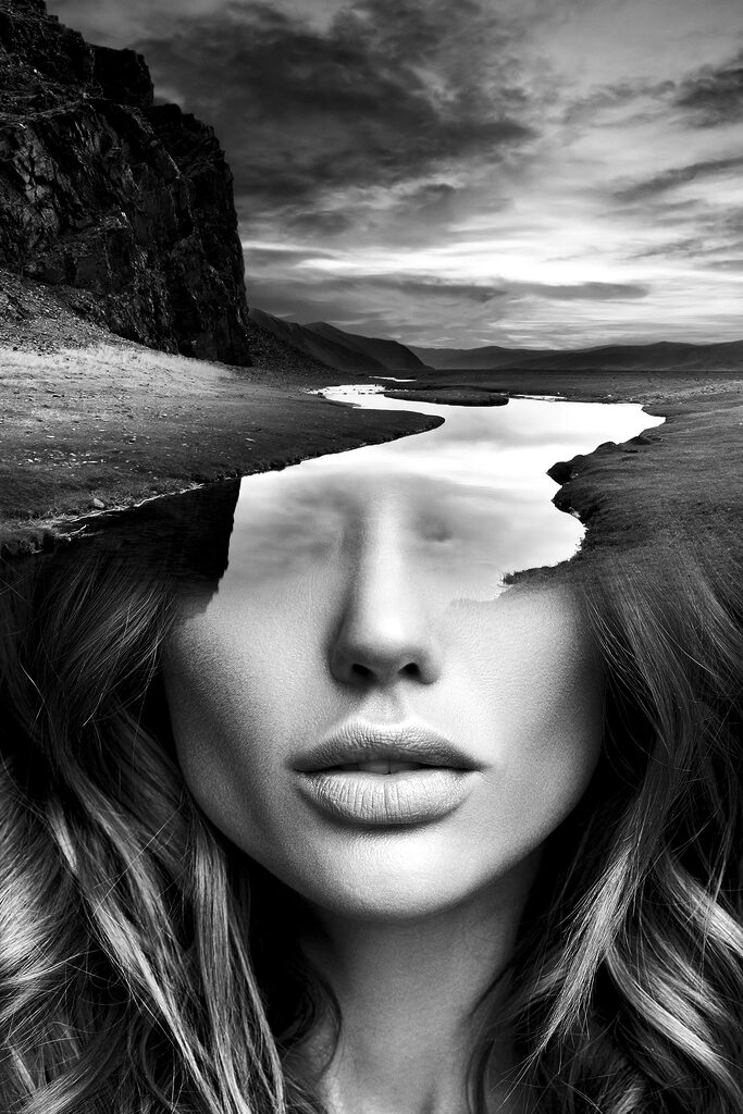A woman's face with a river and mountains A woman's face with a river and mountains
