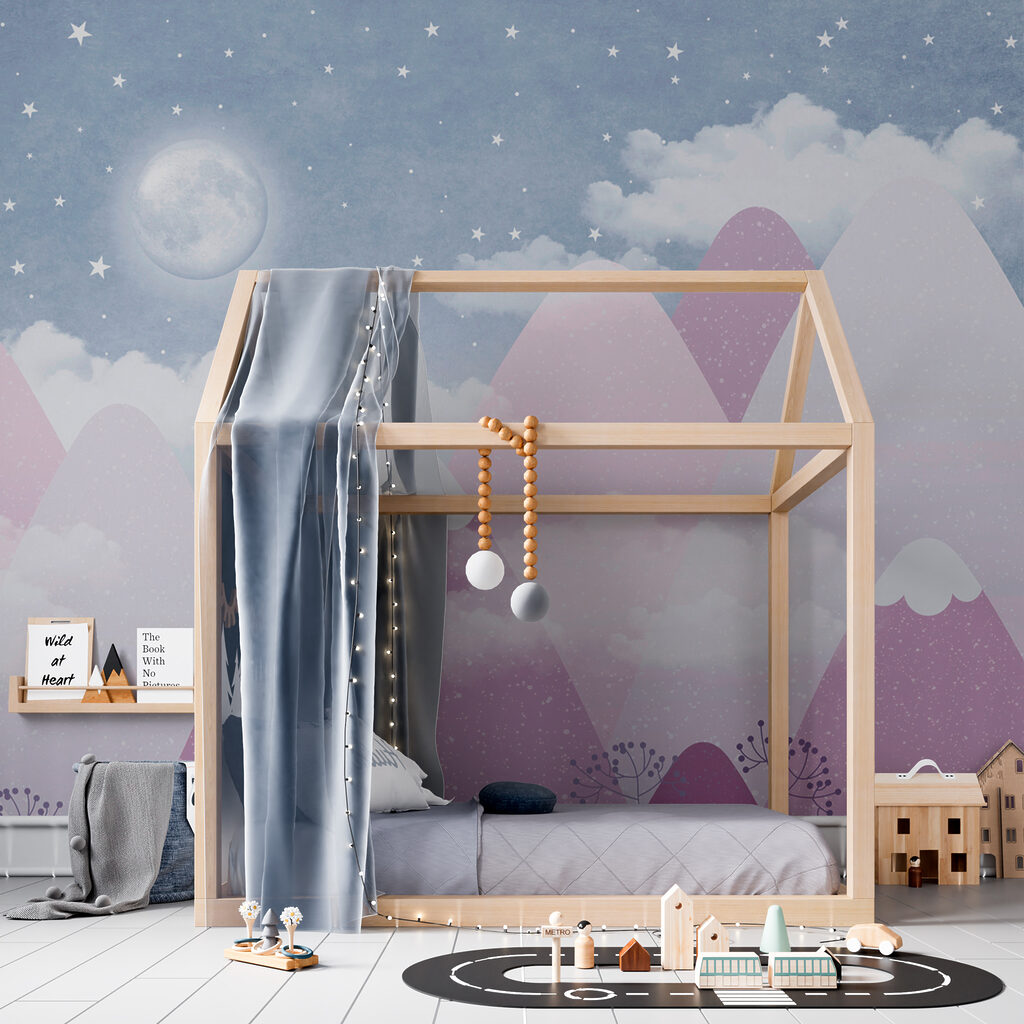 A moon over mountains and clouds