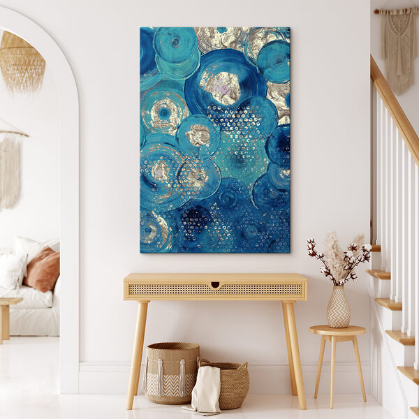 A blue and silver circle painting