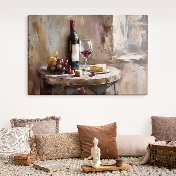A wine bottle and grapes on a table A wine bottle and grapes on a table