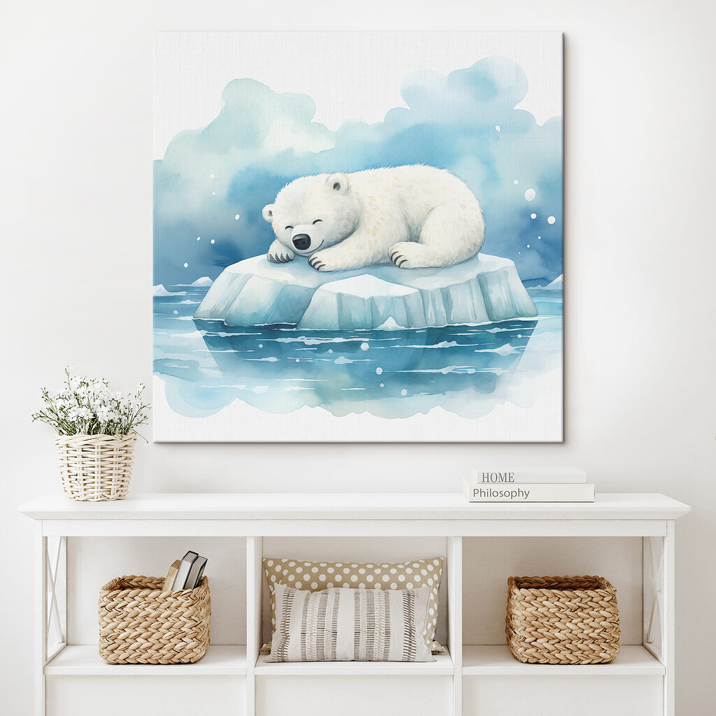 A polar bear lying on an iceberg in water