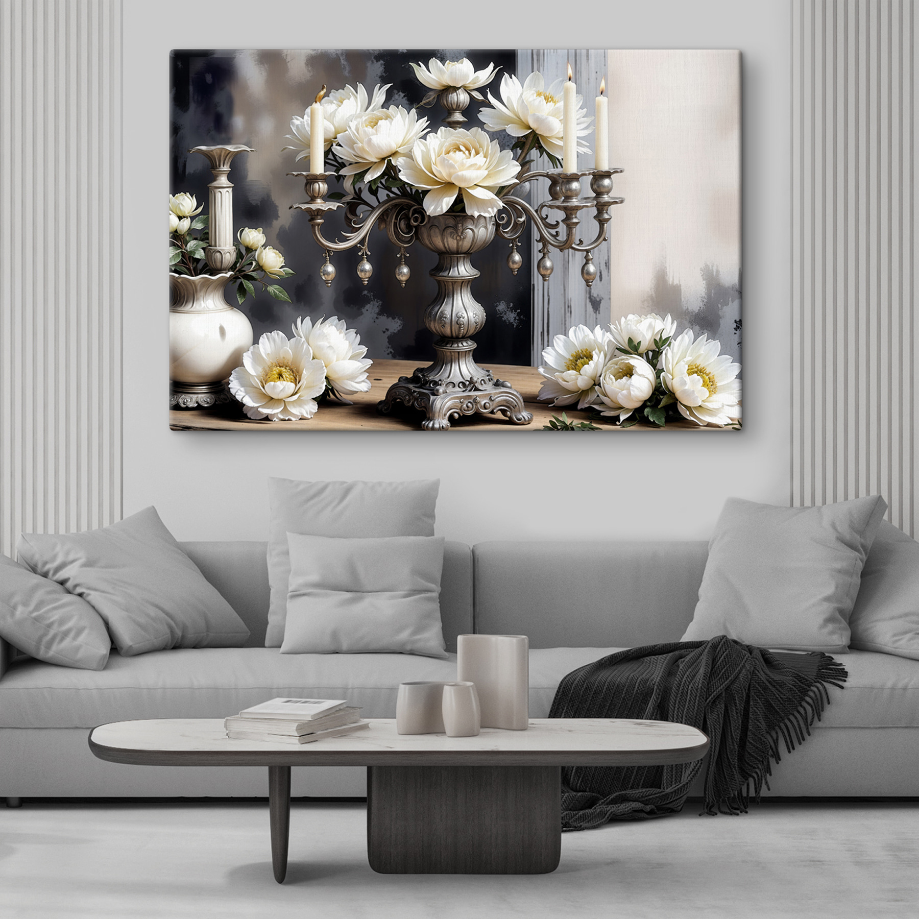 A silver candelabra with white flowers A silver candelabra with white flowers