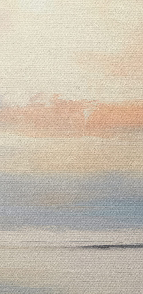 Calm body of water with clouds in the sky