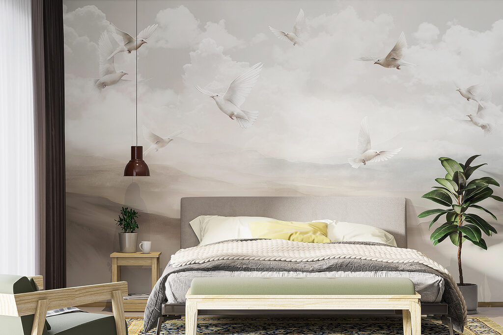 Group of white birds flying in the sky