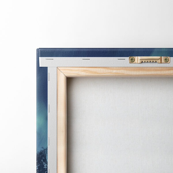 Aurora borealis over a snowy mountain Aurora borealis over a snowy mountain