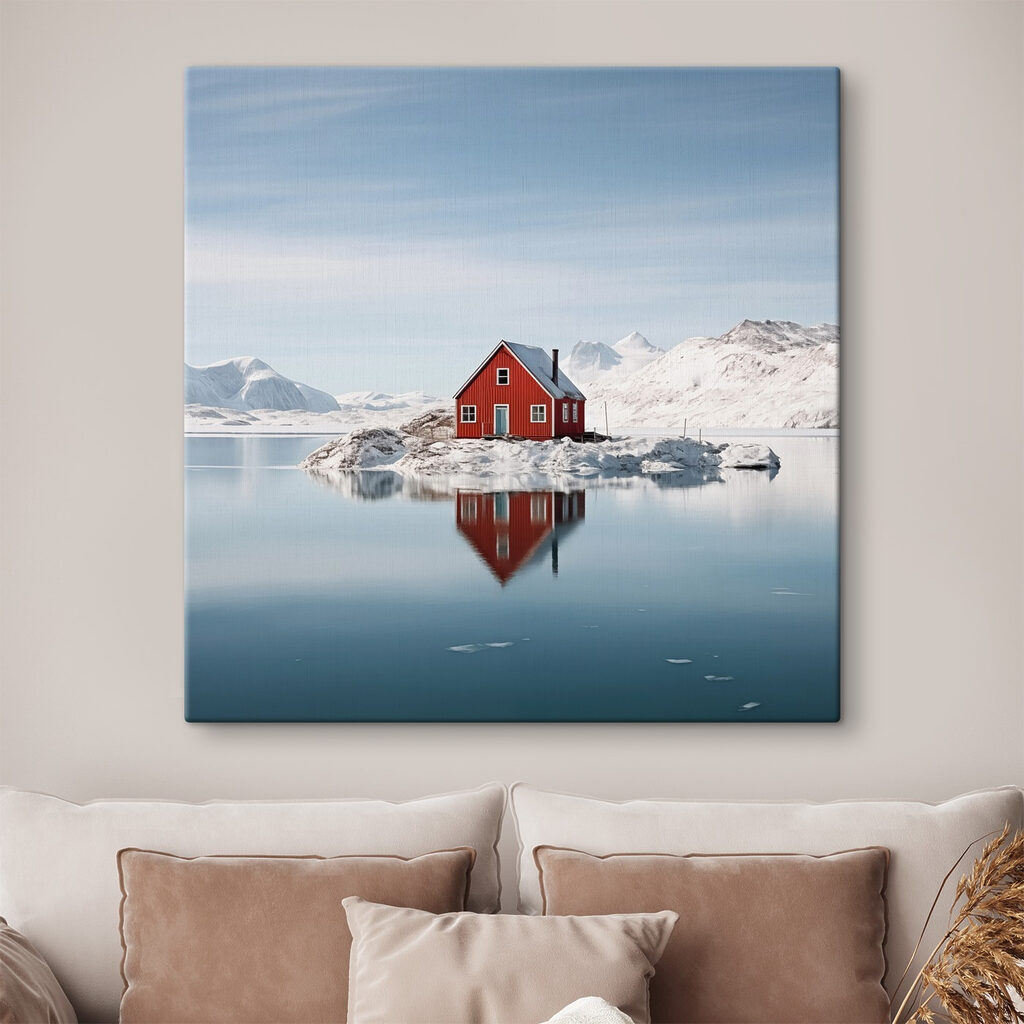 Red house on an island in water with snow covered mountains in the background Red house on an island in water with snow covered mountains in the background