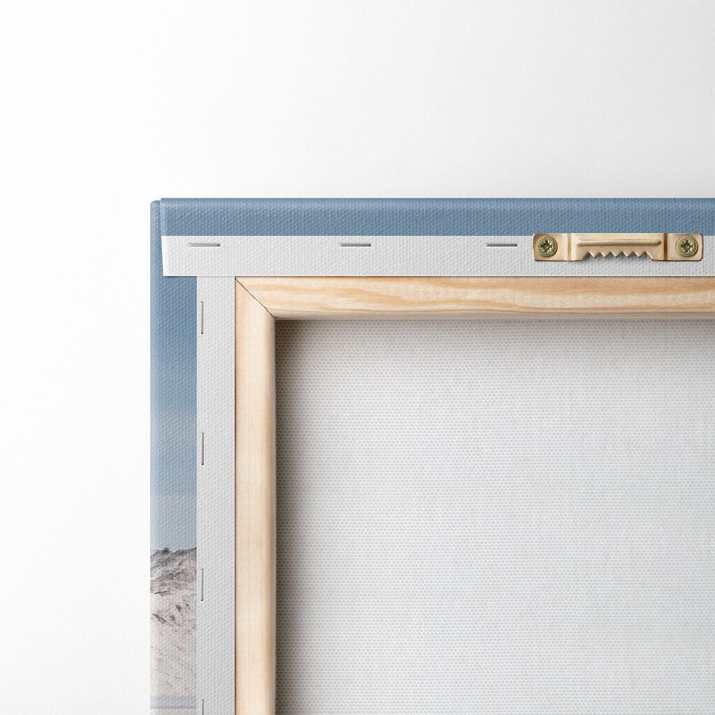 Red house on an island in water with snow covered mountains in the background Red house on an island in water with snow covered mountains in the background