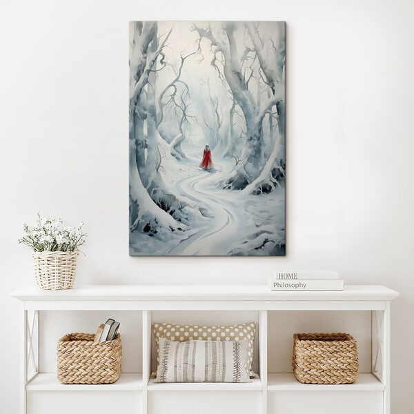 Person in a red cape walking through a snowy forest Person in a red cape walking through a snowy forest