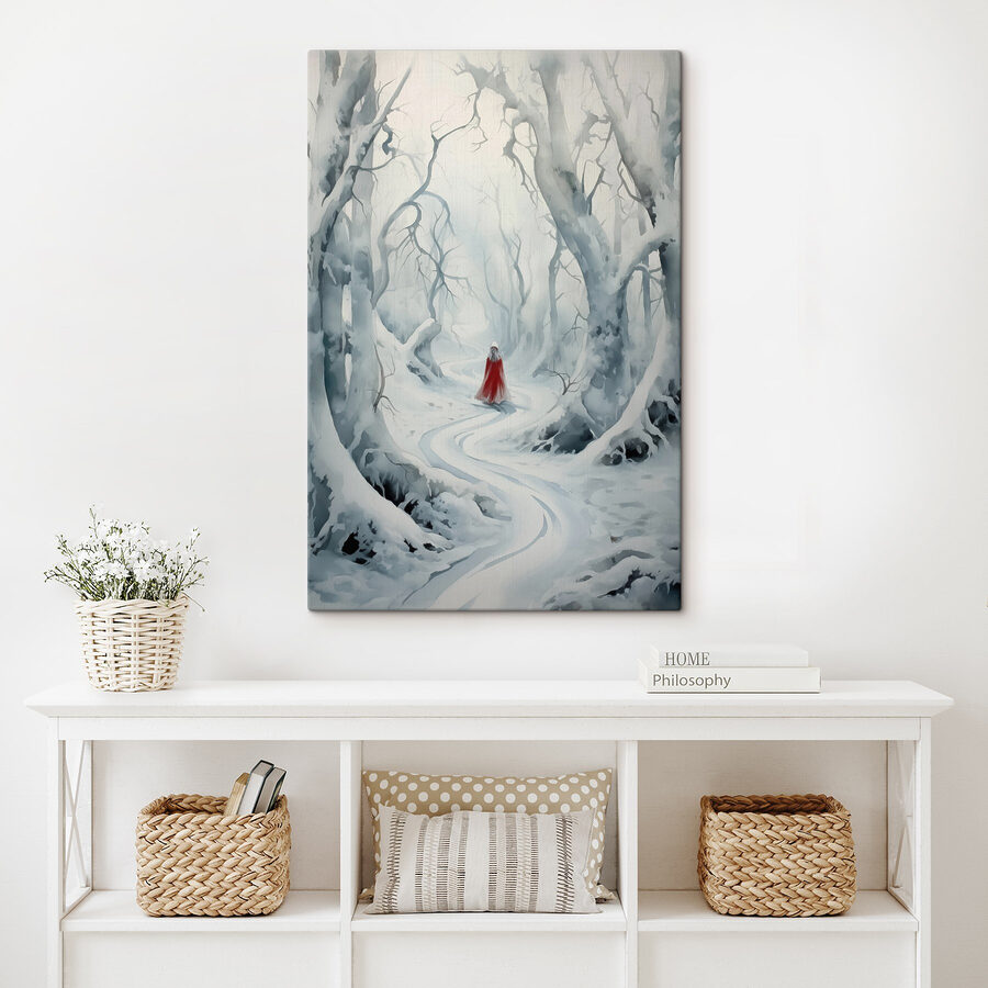 Person in a red cape walking through a snowy forest Person in a red cape walking through a snowy forest