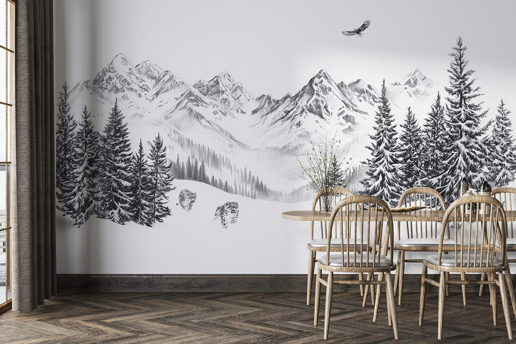 Snowy mountain landscape with trees and a bird flying over it