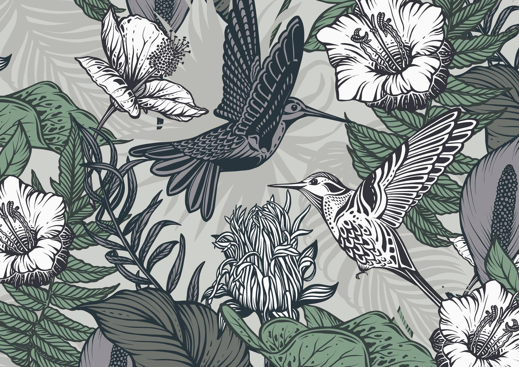 Bird flying over flowers