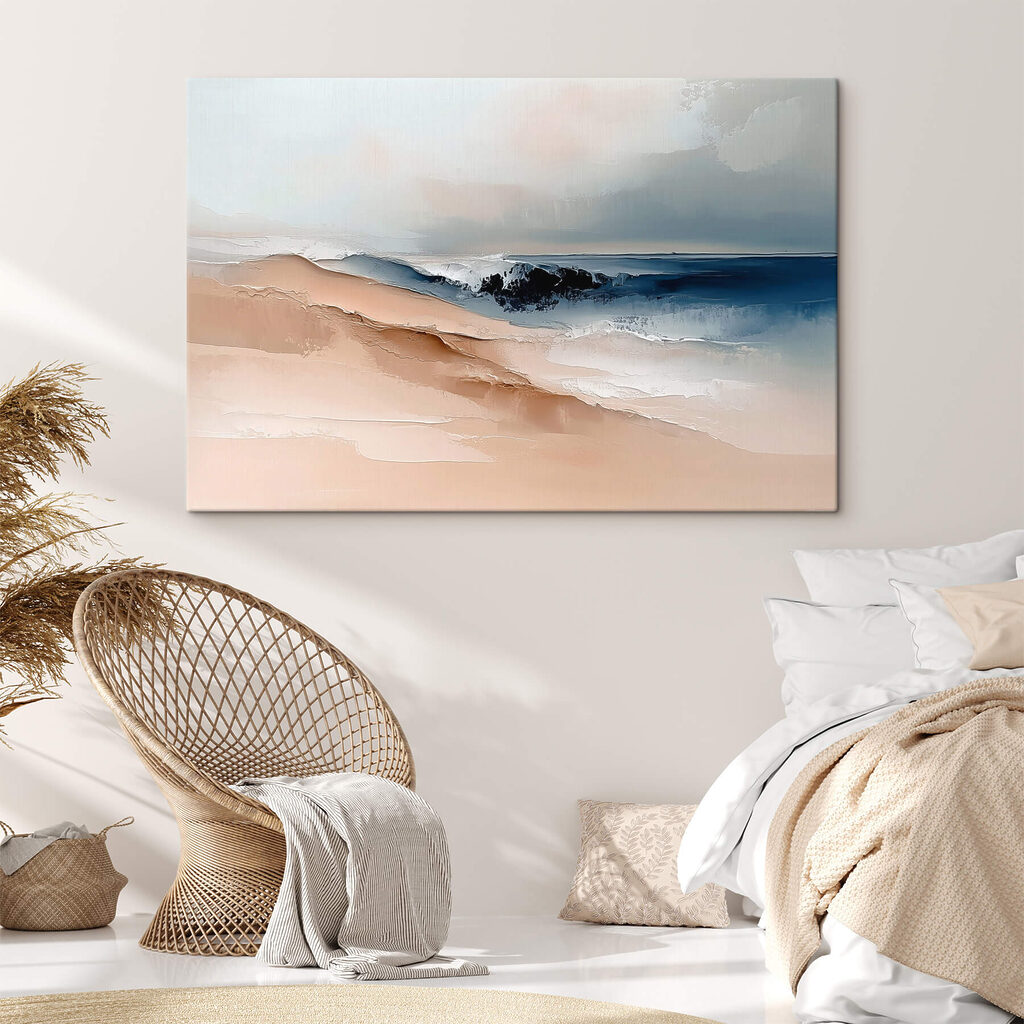 Sand dune with waves in the background