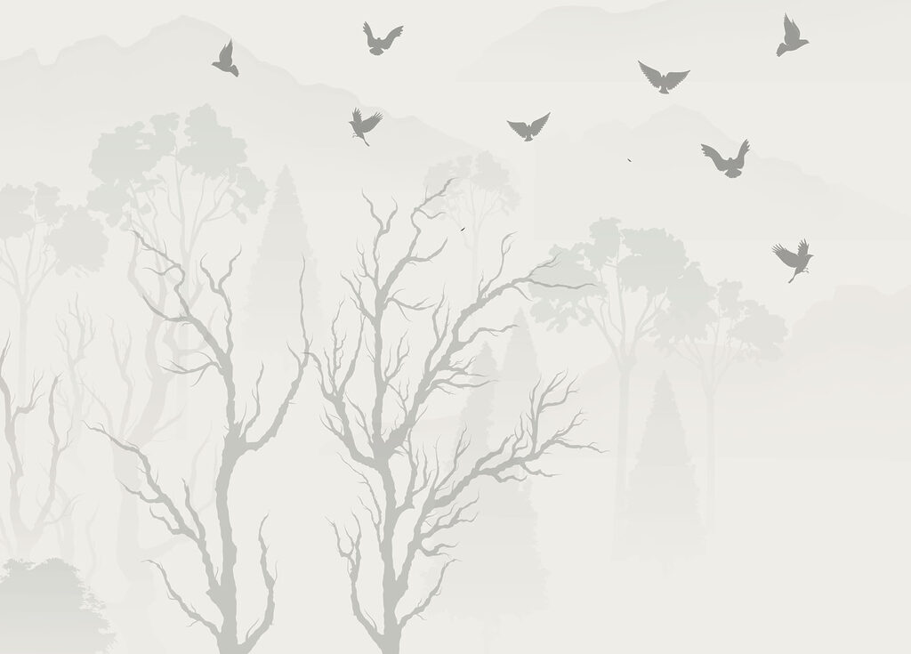 Birds flying over trees