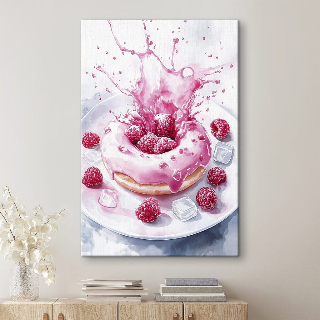 Donut with pink frosting and raspberries splashing into a white plate