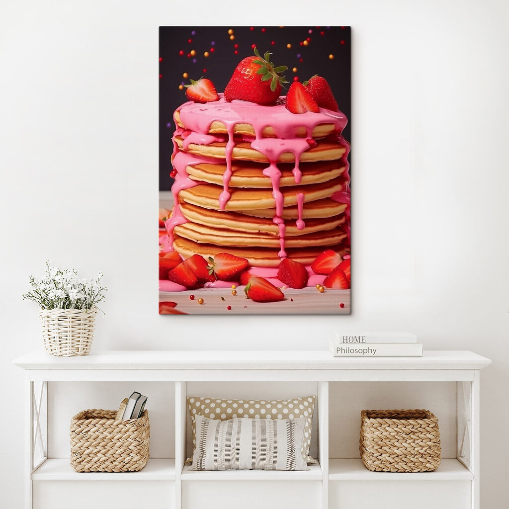 Stack of pancakes with pink frosting and strawberries
