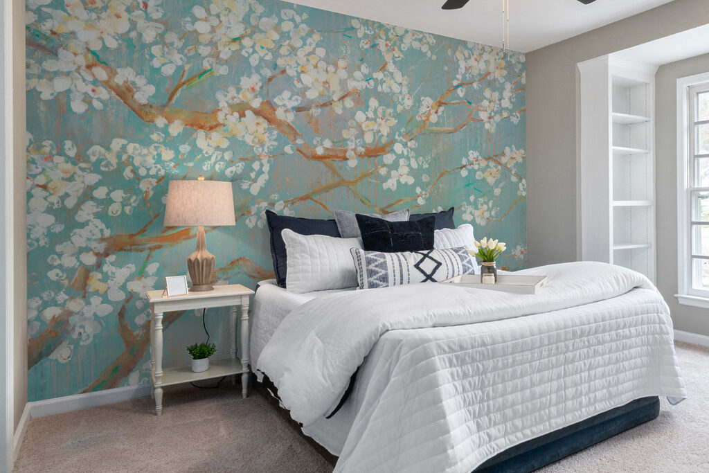 Painting of a tree branch with white flowers