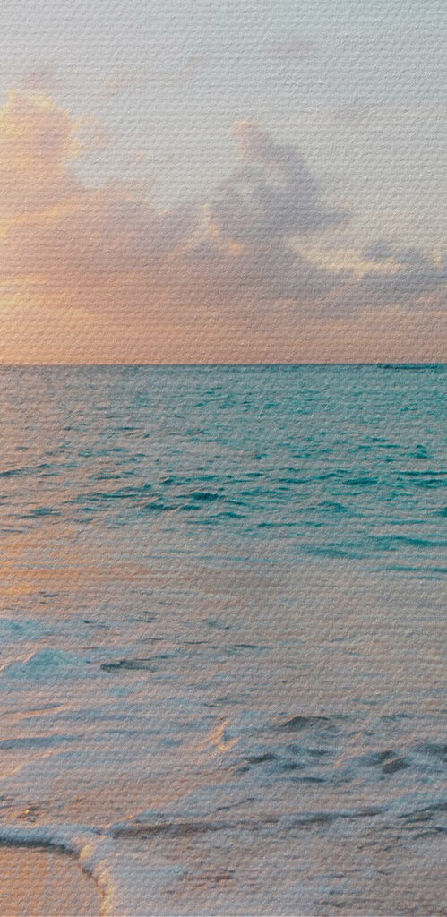 A beach with waves and a sunset A beach with waves and a sunset