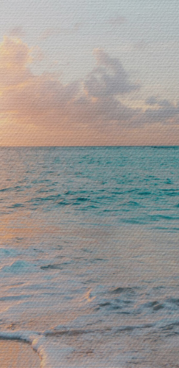 A beach with waves and a sunset A beach with waves and a sunset
