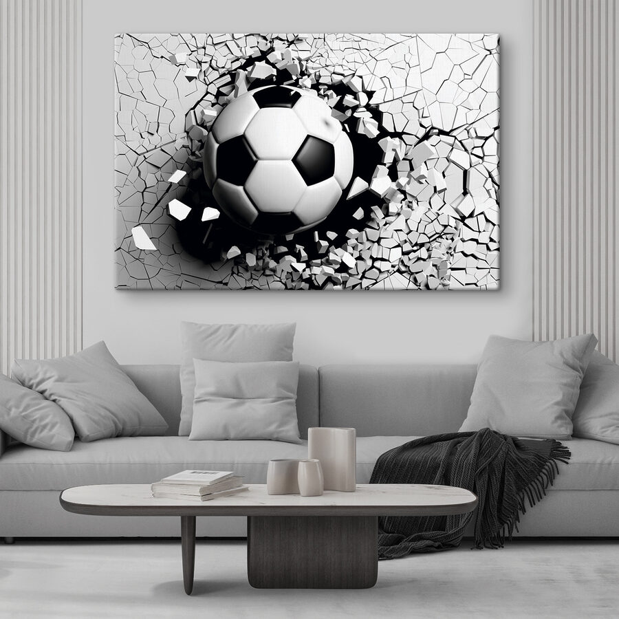 O minge de fotbal care trece printr-un zid O minge de fotbal care trece printr-un zid