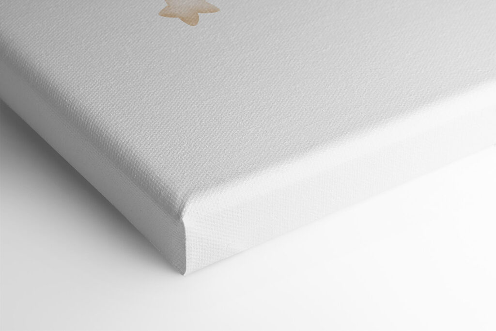 A teddy bear sitting on a cloud