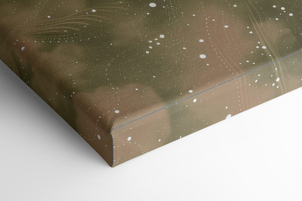 A white mandala on a green and blue background