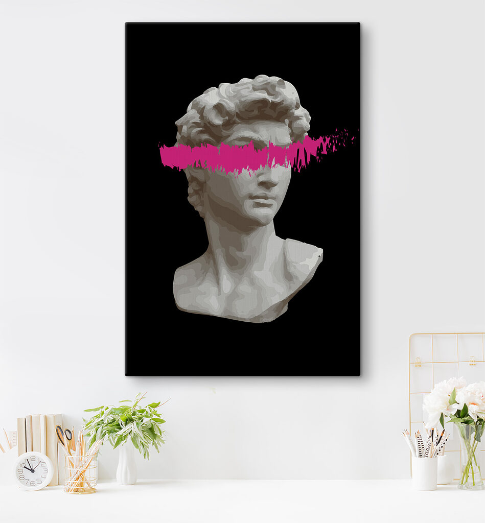 A statue of a man with a pink line