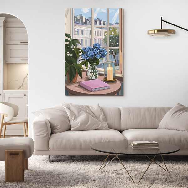 Vase of flowers and a candle in front of a window Vase of flowers and a candle in front of a window