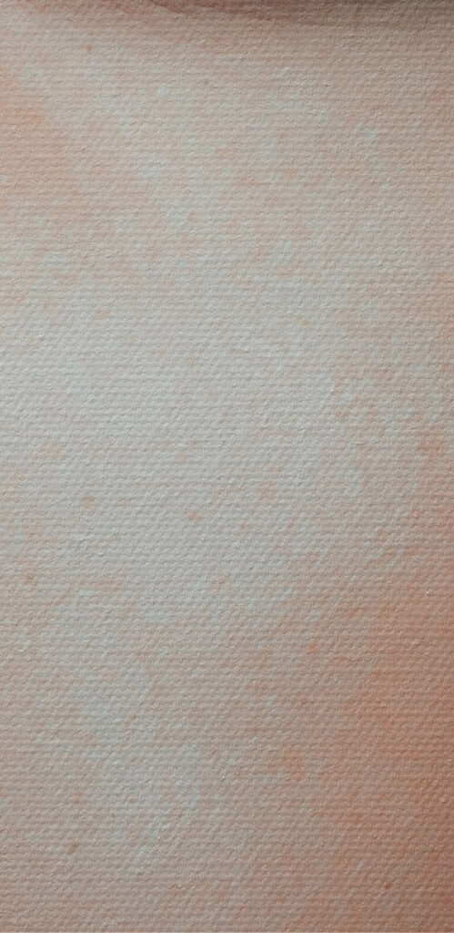 Woman's face with a torn paper