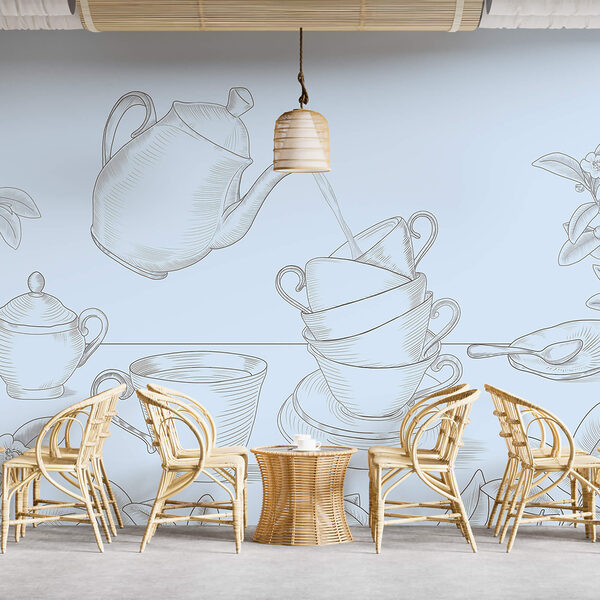 Ceainic turnând într-o stivă de cești de ceai