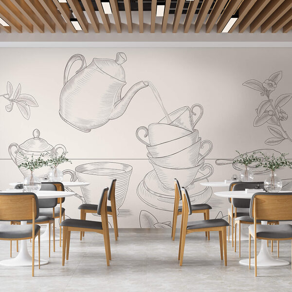 Ceainic turnând într-o stivă de cești de ceai