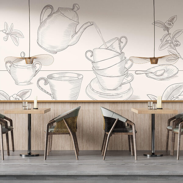 Ceainic turnând într-o stivă de cești de ceai