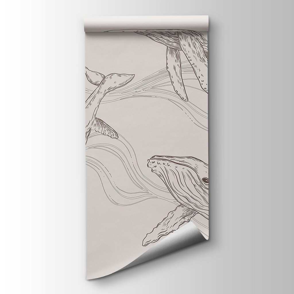 A group of whales swimming in the water