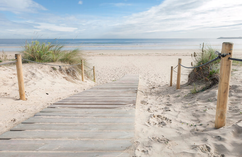 Wooden walkway leading to a beach