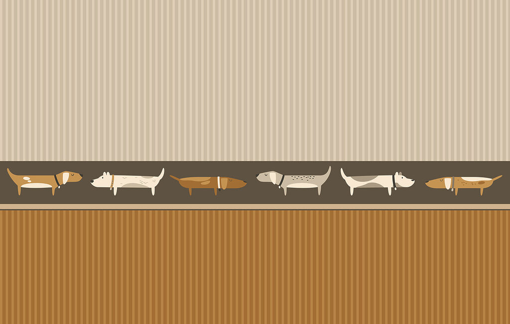 Row of dogs on a wall Row of dogs on a wall