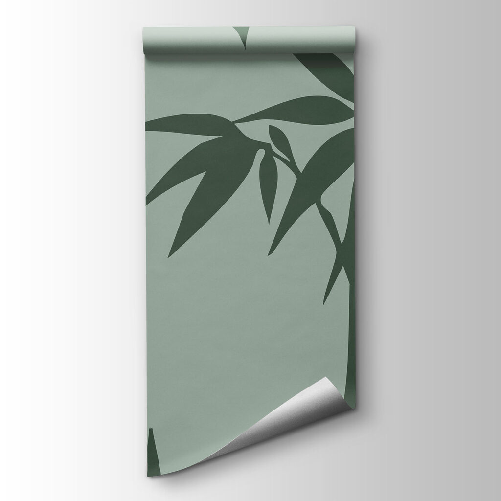 Green bamboo leaves on a grey background Green bamboo leaves on a grey background