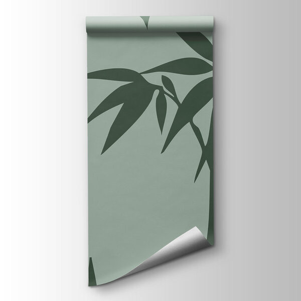 Green bamboo leaves on a grey background Green bamboo leaves on a grey background