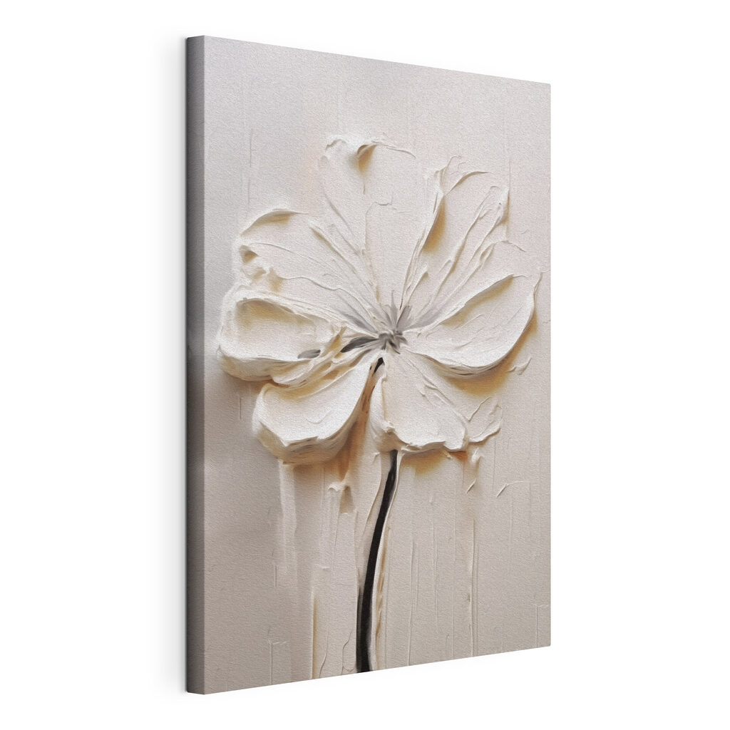 White flower carved into a white surface White flower carved into a white surface