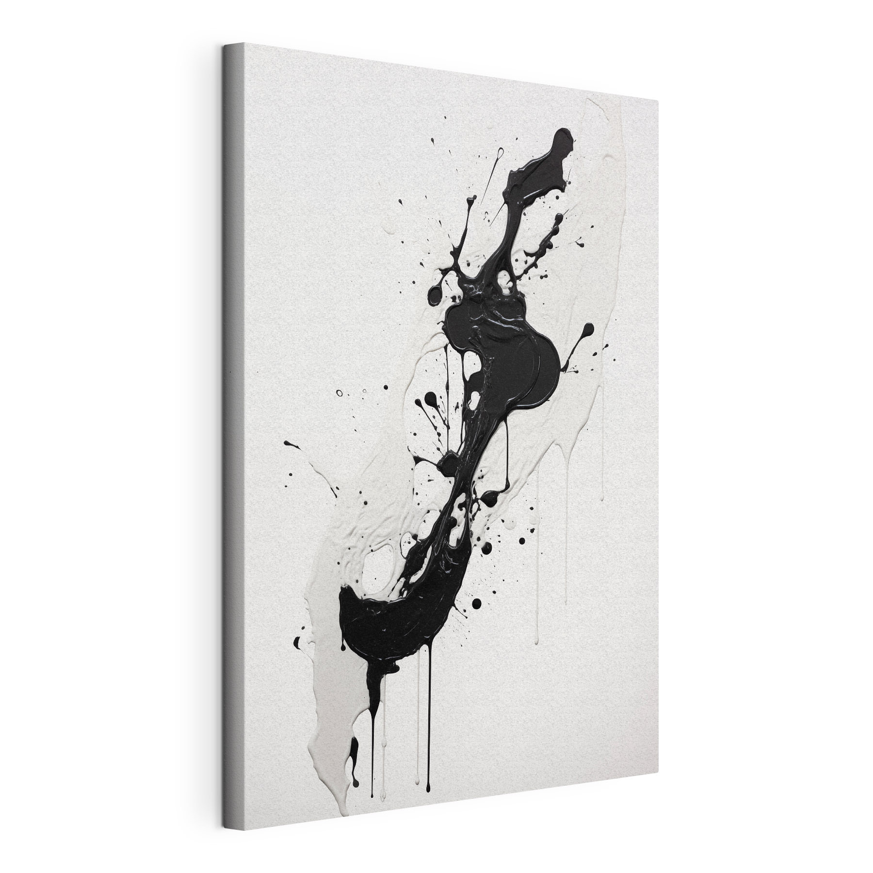 Black and white paint splattered on a white surface