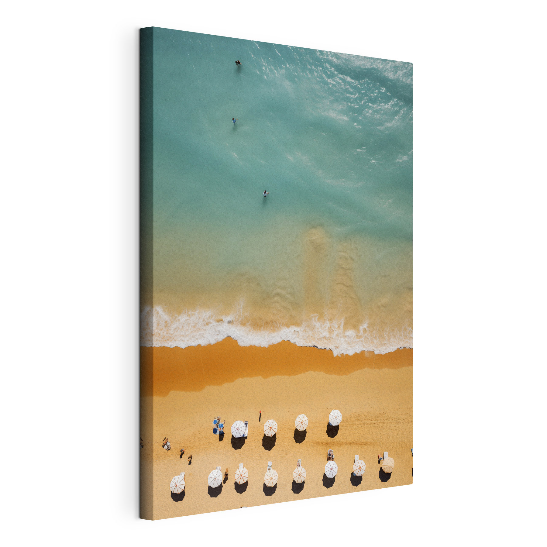 Group of people on a beach with umbrellas